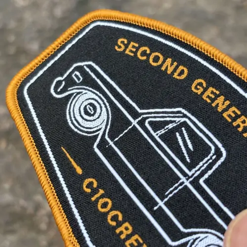 Back view of a Velcro patch, showcasing the attachment option for versatile use.
